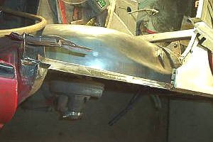Getting ready to repair the tab at the top of the driver side inner fender