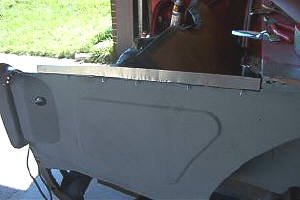 Adding new flange to passenger side rear deck extension